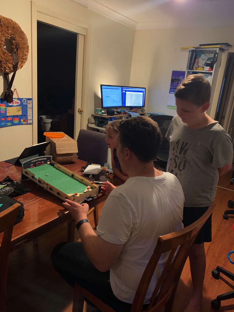 Dad having a look at the pinball machine Puff built